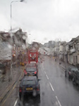 SX20132 Traffic seen through rainy bus window.jpg